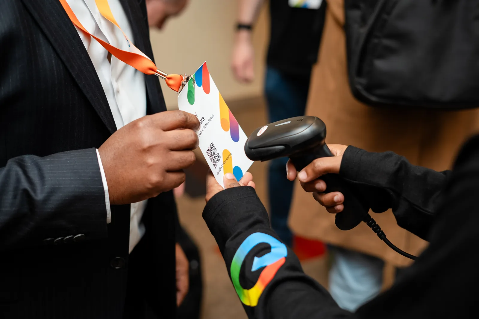 Event team member scanning a delegate badge at a live event