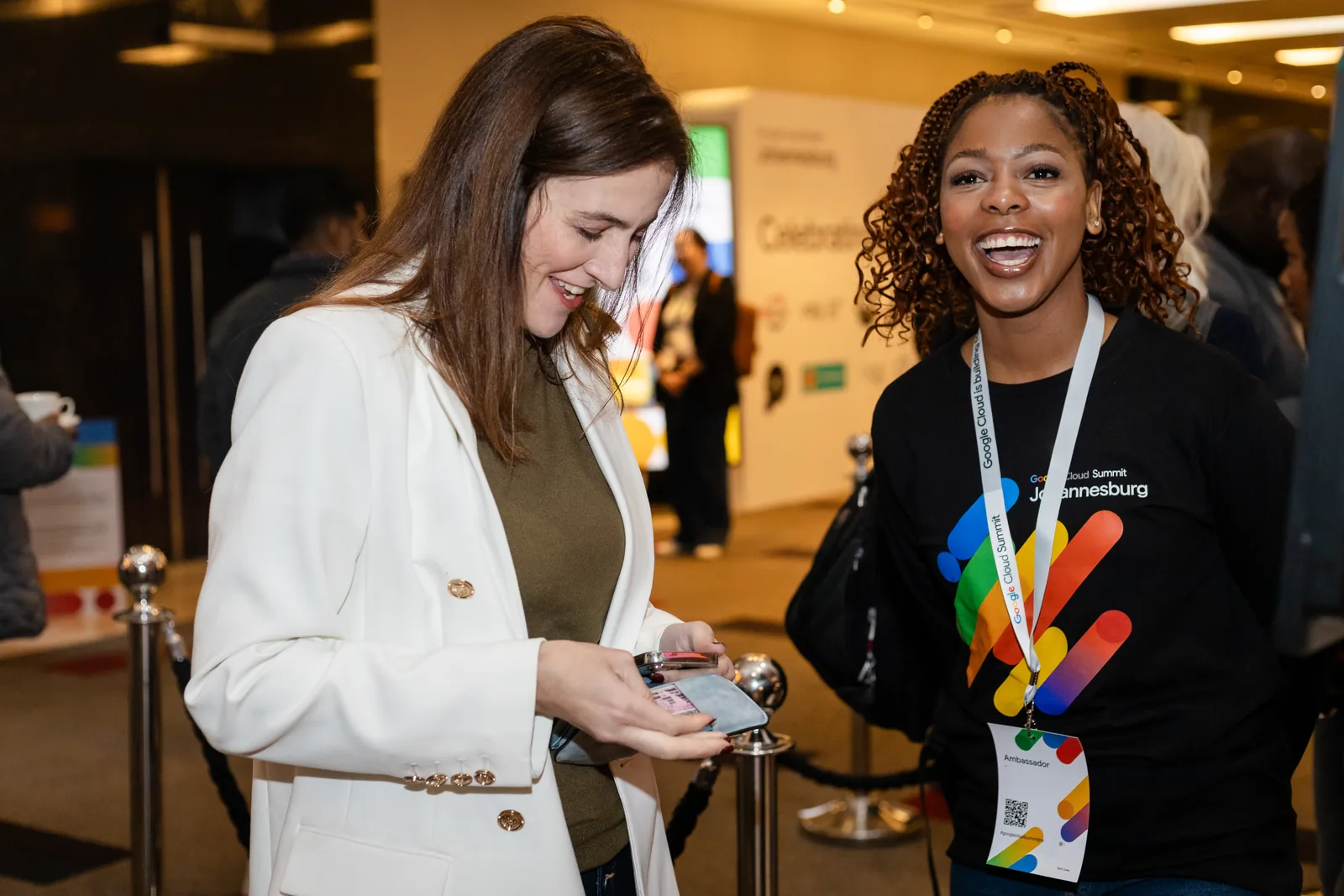 Onsite registration team member assisting a delegate